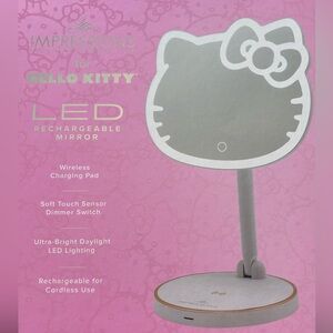 Impressions for Hello Kitty LED Rechargeable Mirror.  Dimensions:  9 x 13.7